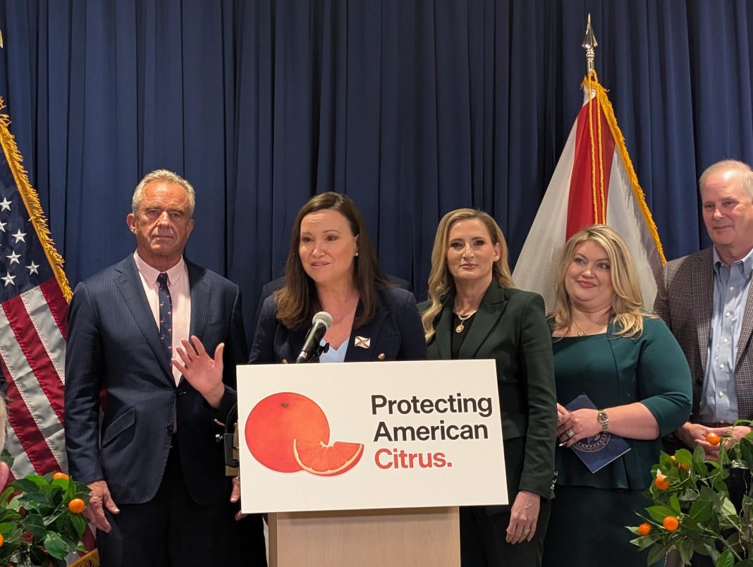 Florida officials and federal lawmakers at a Lakeland event announcing the orange juice standard change