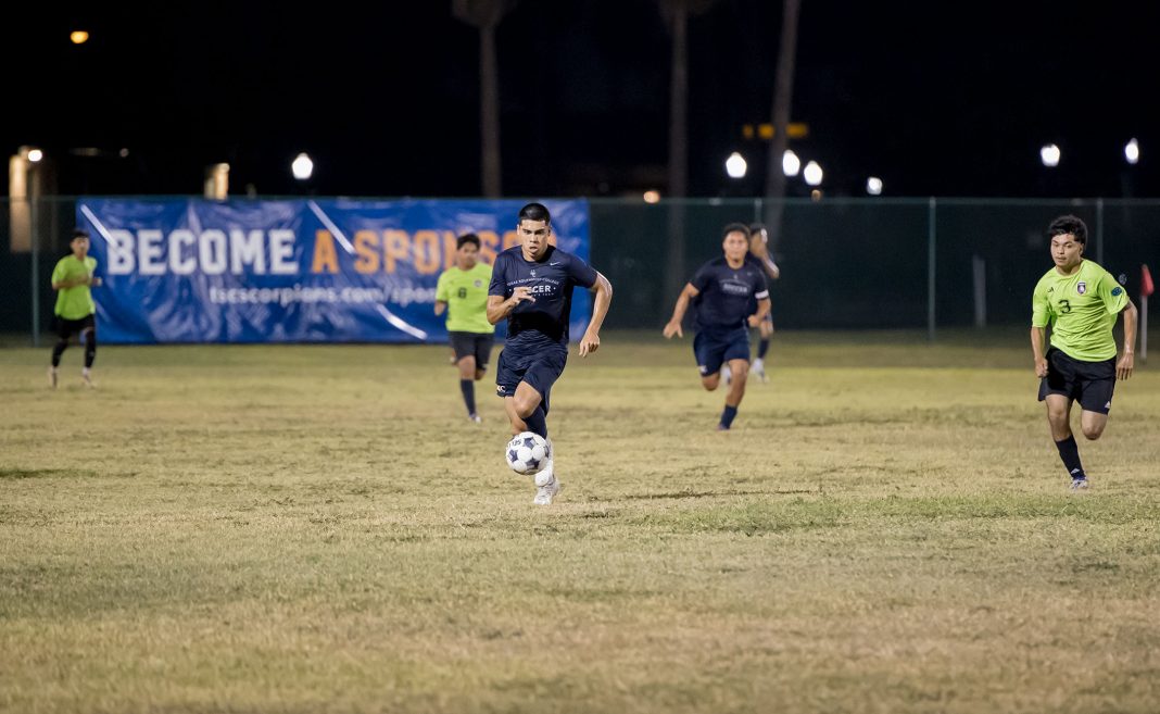 Texas Southmost College men's soccer players compete against Lone Star SC