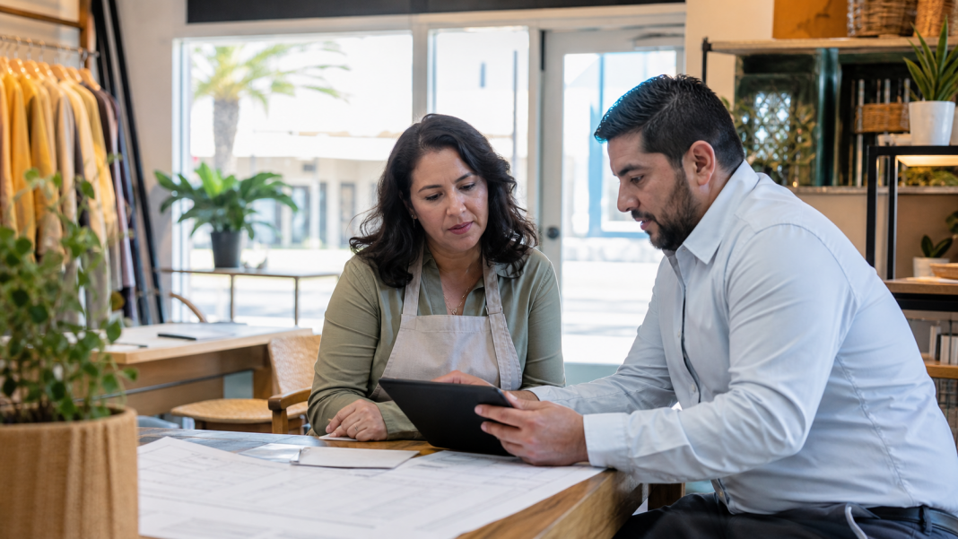 Entrepreneurs work in a modern business incubator in downtown Brownsville