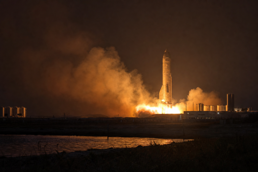 Nighttime static-fire test at a South Texas coastal launch site
