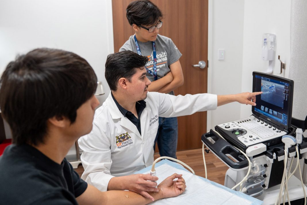 UT Health RGV physician demonstrating a procedure for a student