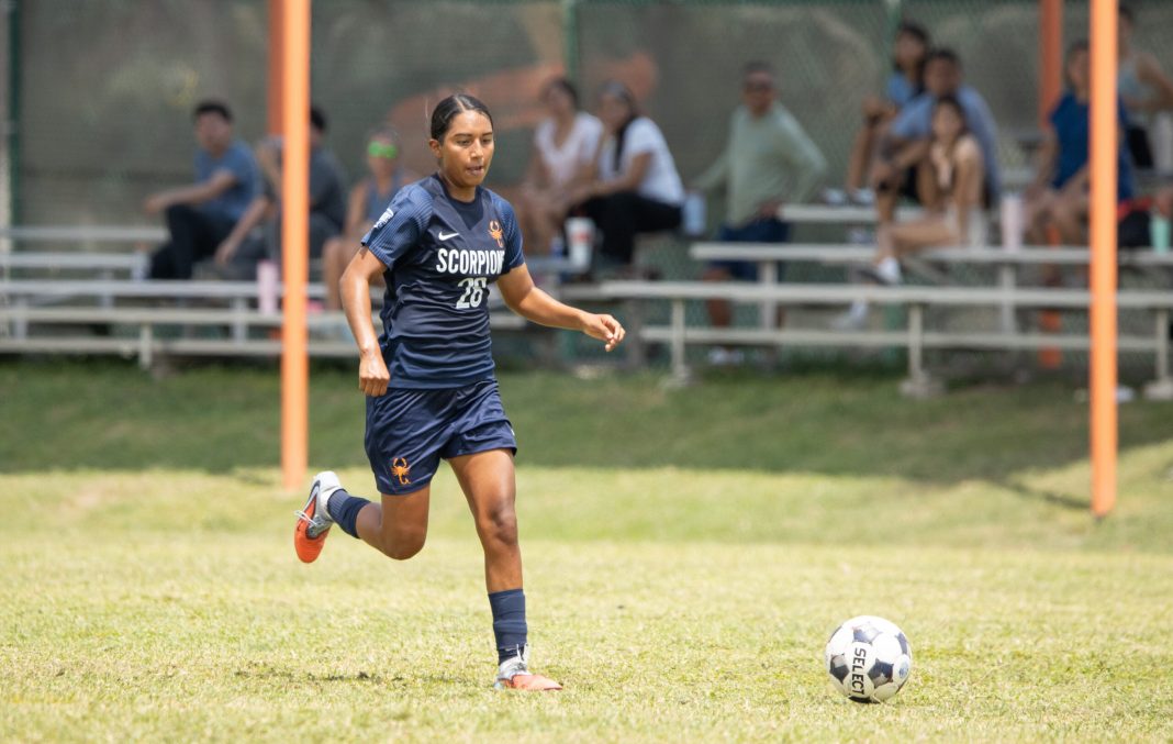 Texas Southmost College player Abril Martinez advances the ball against Northeast Texas Community College.